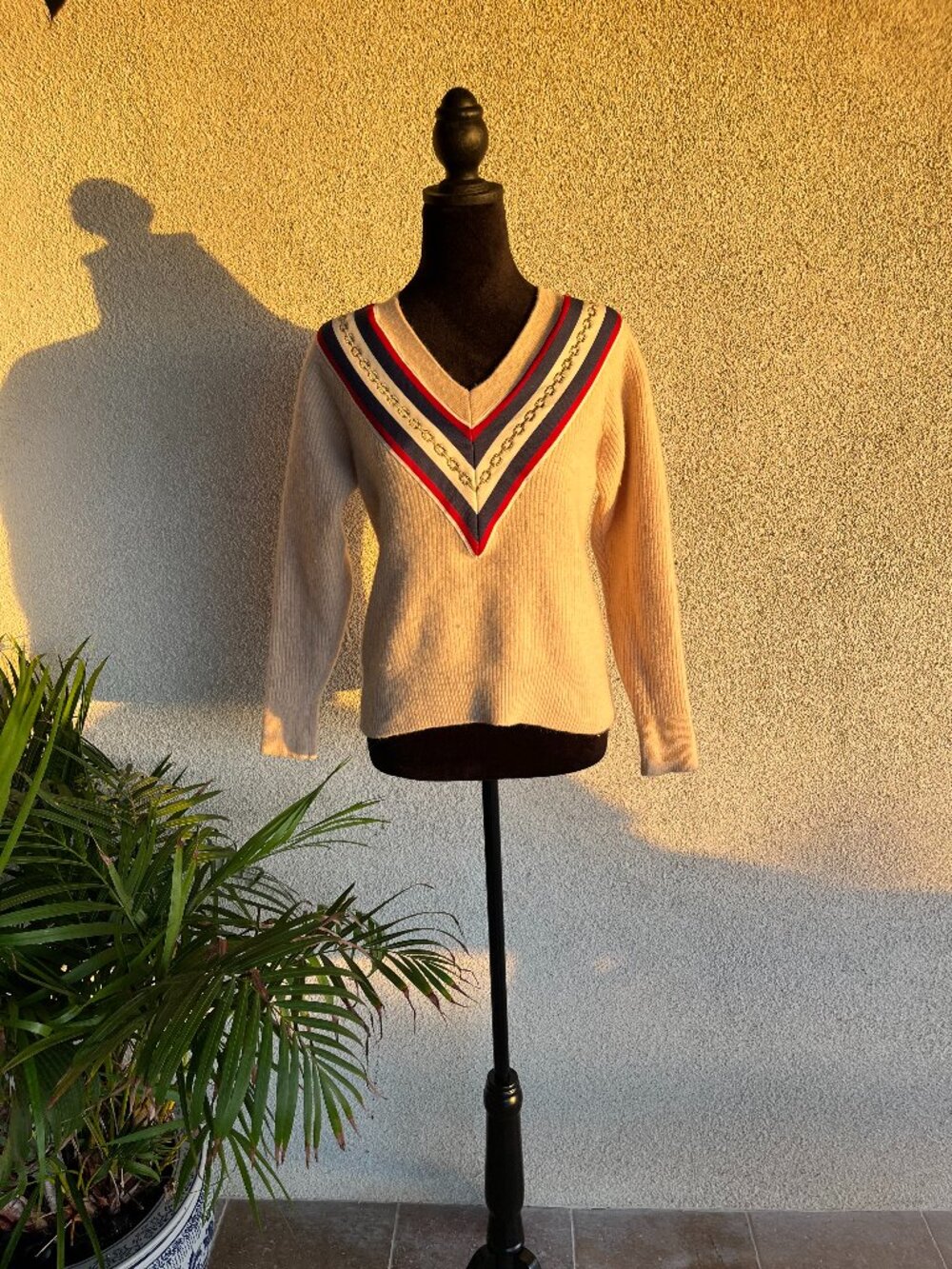 Red, white, and blue cream sweater